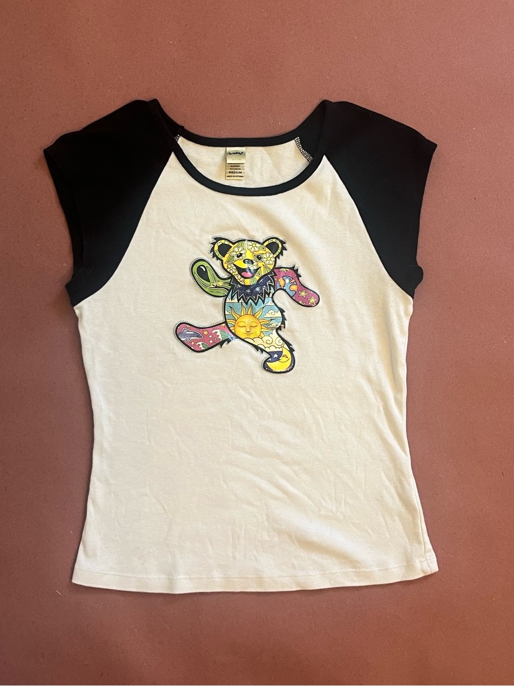 Kavio White Grateful Dead Tee with Black Raglan Sleeves and Colorful Bear Patch